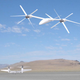 Illustration for article titled This Is How DARPAs Robotic VTOL X-Planes Will Dominate The Sky